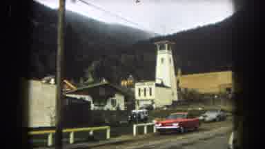 Summit County Colorado USA (1962): People Walking The Streets Near Yellow Building