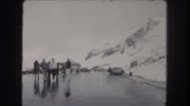Summit County Colorado USA (1962): Group Of People Walking Across A Slick Road