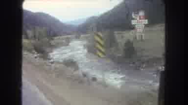 Summit County Colorado USA (1962): Driving On Highway Through Mountain Valley Next