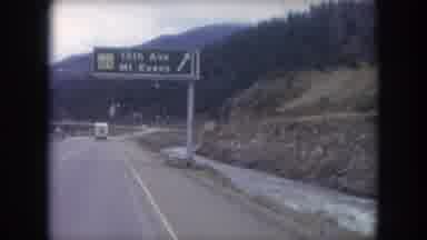 Winter Park Colorado USA (1962): Driving On The Highway Towards The Mountains And