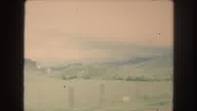 Winter Park Colorado USA (1962): Passing View Of Mountains And Trees On A Cloudy