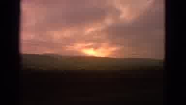 Barrington Illinois USA (1963): A Beautiful Sunset Over The Mountains On A Long