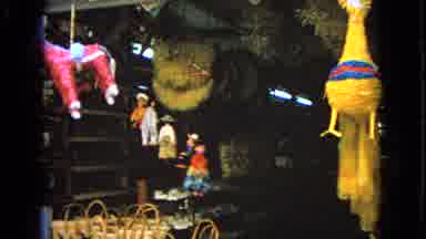 Barrington Illinois USA (1963): Pinatas In A Hispanic Market Woman Shopping As Man