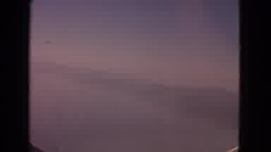 Barrington Illinois USA (1963): Aerial View Of Mountains And Ocean On A Cloudy Day