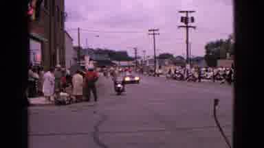 Barrington Illinois USA (1963): Police Escort At The Start Of A Crowded Parade In