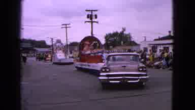 Barrington Illinois USA (1963): Plots On Vehicles Are Moving Down The Road Watched