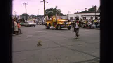 Barrington Illinois USA (1963): Clowns Drive Yellow Truck As The Circus Parades