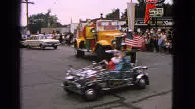 Barrington Illinois USA (1963): Clowns Riding In A Small Car In The Parade After
