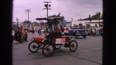 Barrington Illinois USA (1963): Vehicles Driving Down The Parade Route In A Small