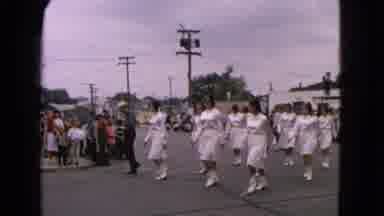 Barrington Illinois USA (1963): Nine Girls In White Drill Team Outfits March Down