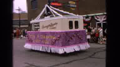 Barrington Illinois USA (1963): People Watching A Purple And Yellow Parade Truck
