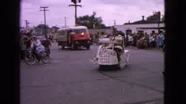 Barrington Illinois USA (1963): People In Bikes And Ambulance And Horses Going By