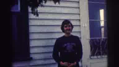 Bowling Green University USA (1963): Young Boy Stands Happily Outside Of Older