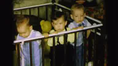 Camden New Jersey (1963): Three Little Boys Standing Up In A Wooden Playpen