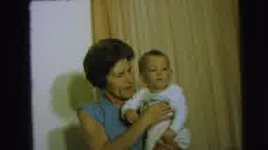 Camden New Jersey (1963): Grandmother Holds Baby Up And Talks To Him Then Gently