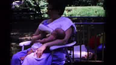 Cold Springs New York USA (1963): The Mother Is Doing To Feed The Milk With Our