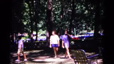 Cold Springs New York USA (1963): Two People In Shorts Walking In The Park During
