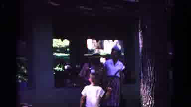 Cold Springs New York USA (1963): Boy Wearing White Shirt Twirls Brown Stick On A