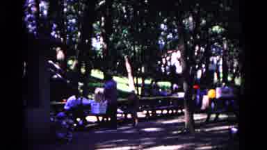 Cold Springs New York USA (1963): Woman In Sunglasses Surrounded By People And