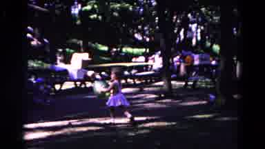 Cold Springs New York USA (1963): Little Girl In White Dress Has Fun At The Picnic
