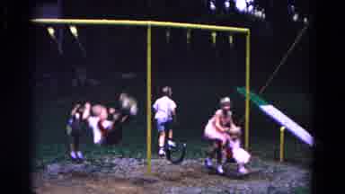 Cold Springs New York USA (1963): Five Children Wearing Shorts And Dresses Play On