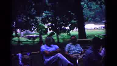 Cold Springs New York USA (1963): People Sit And Talk At An Outdoor Party