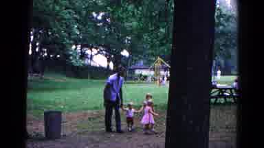 Cold Springs New York USA (1963): Father Leads His Children By Hand Towards The