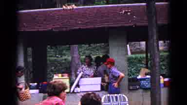 Cold Springs New York USA (1963): Lady Searching Her Basket In The Marketplace