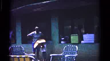 Cold Springs New York USA (1963): Father Helps His Young Son Put On A Giant Hat!