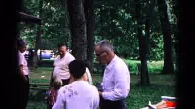 Cold Springs New York USA (1963): People Standing Around In A Yard With Trees