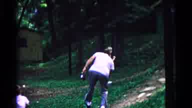 Cold Springs New York USA (1963): Man Playing Catch With A Little Boy Using A Red