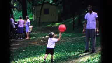 Cold Springs New York USA (1963): Man And Small Boy Playing Catch With A Red Ball