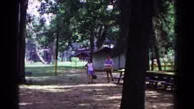 Cold Springs New York USA (1963): A Couple Are Walking And Talking In The Backyard