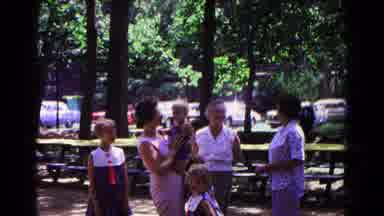 Cold Springs New York USA (1963): Women And Children Talking While Gathered Around