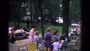 Cold Springs New York USA (1963): People Are Spending A Holiday Under The Shade Of