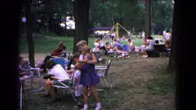 Cold Springs New York USA (1963): A Child Is Playing In The Garden With His Mother