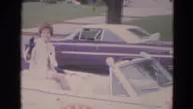 Lincoln Nebraska (1963): A Lady Sitting On Top Of Car Waiving In A Parade
