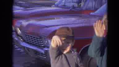 Lincoln Nebraska (1963): Two Young Children Wave Goodbye With A Red Car In The