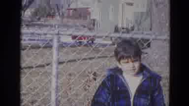 Lincoln Nebraska (1963): Young Boy Wearing Heavy Blue Coat Poses For Camera In