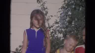 Lincoln Nebraska (1963): A Group Of Kids Standing Outside Taking Picture