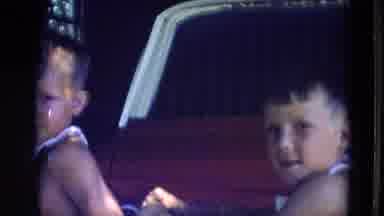 Lincoln Nebraska (1963): Children Staring At Camera Then Waving At Person Behind