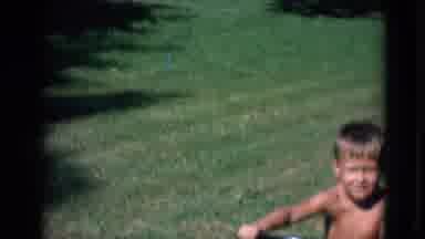 Lincoln Nebraska (1963): The Two Childrens Are Playing A Toy Car In The Garden