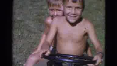 Lincoln Nebraska (1963): Two Boys Riding On Lawnmower