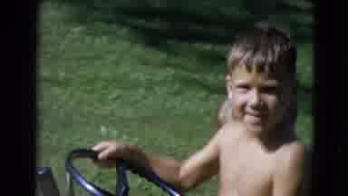Lincoln Nebraska (1963): The Two Kids Are Playing In The Toy Car Very Happily