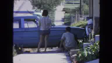 San Francisco California (1963): A Man And A Woman Talking By Their Car While
