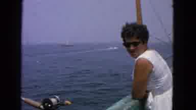 San Francisco California (1963): A Lady Stands On A Boat On The Water Next To A