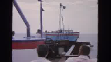 San Francisco California (1963): Men On Boat Driving Towards Another Boat On The