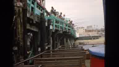 San Francisco California (1963): Many People Fishing Off Of An Ocean Pier Cut To