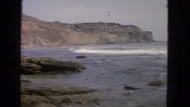 San Francisco California (1963): Rocky Coastline With Waves Gently Rolling Up