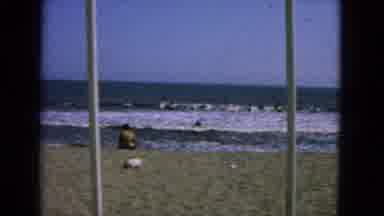 San Francisco California (1963): Surfers Riding A Small Wave Heading Towards The